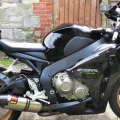 So this is how the bike looked the day I bought it .
The Akra has now gone and so has that hugger and loads of other stuff done .
More pics when I take them .........
